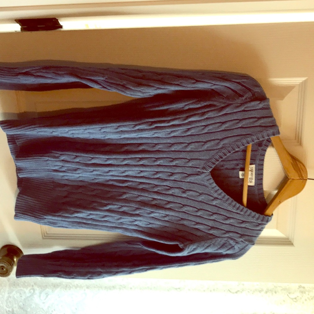 Cableknit, V-neck sweater. Light blue.